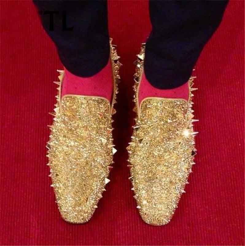 gold studded loafers
