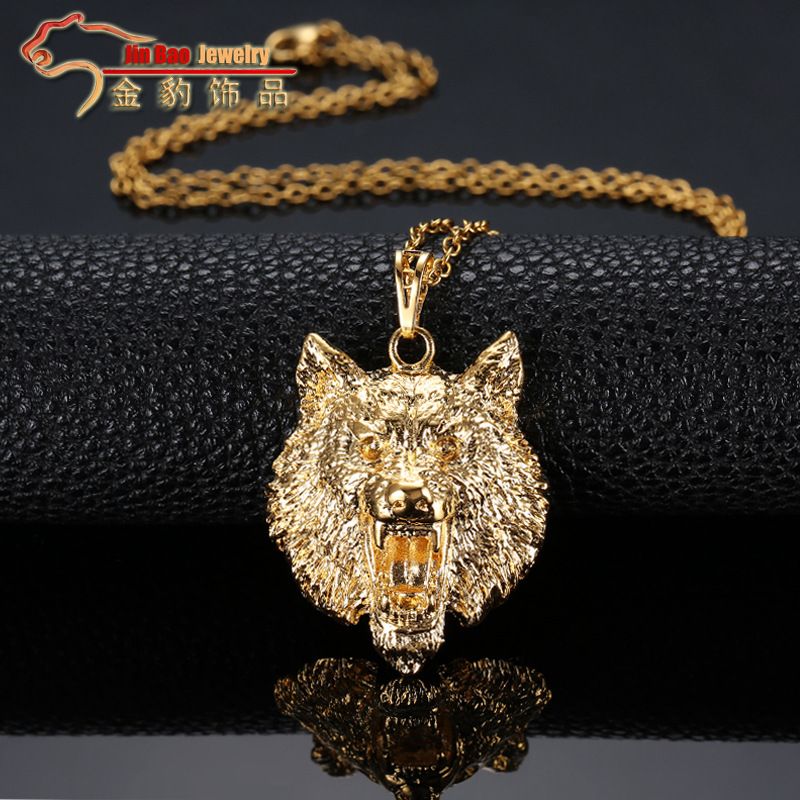 solid gold wolf pendant