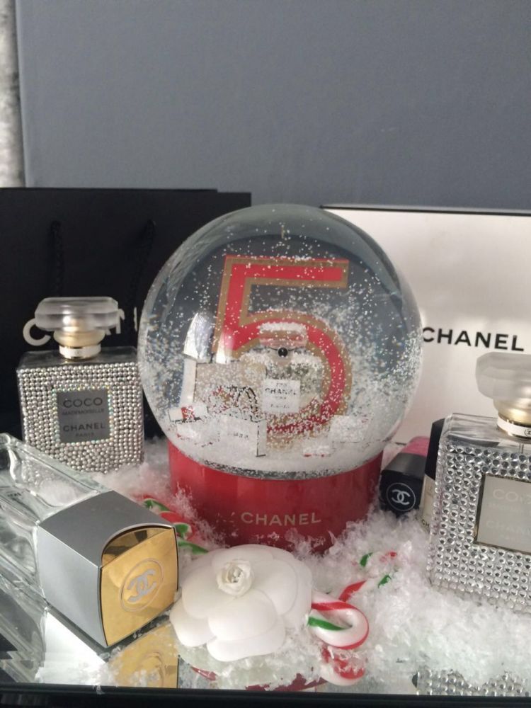 electric snow globe with red no 5 perfume bottle inside snow crystal electric snow globe christmas