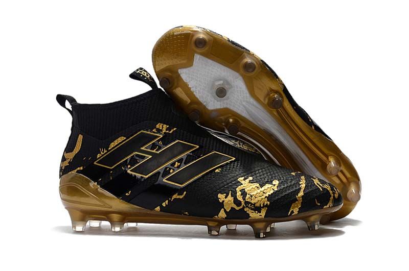 black and gold football boots