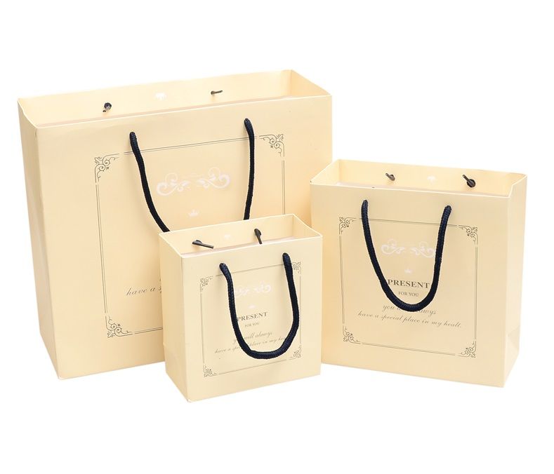 Wholesale Simple Design Paper Bag For Beautiful Gift Packing Classic Hand Length Handle Package Rolls Of Wrapping Sale Wholesale Simple Design Paper Bag For Beautiful Gift Packing Classic Hand Length Handle Package Rolls Of Wrapping Sale