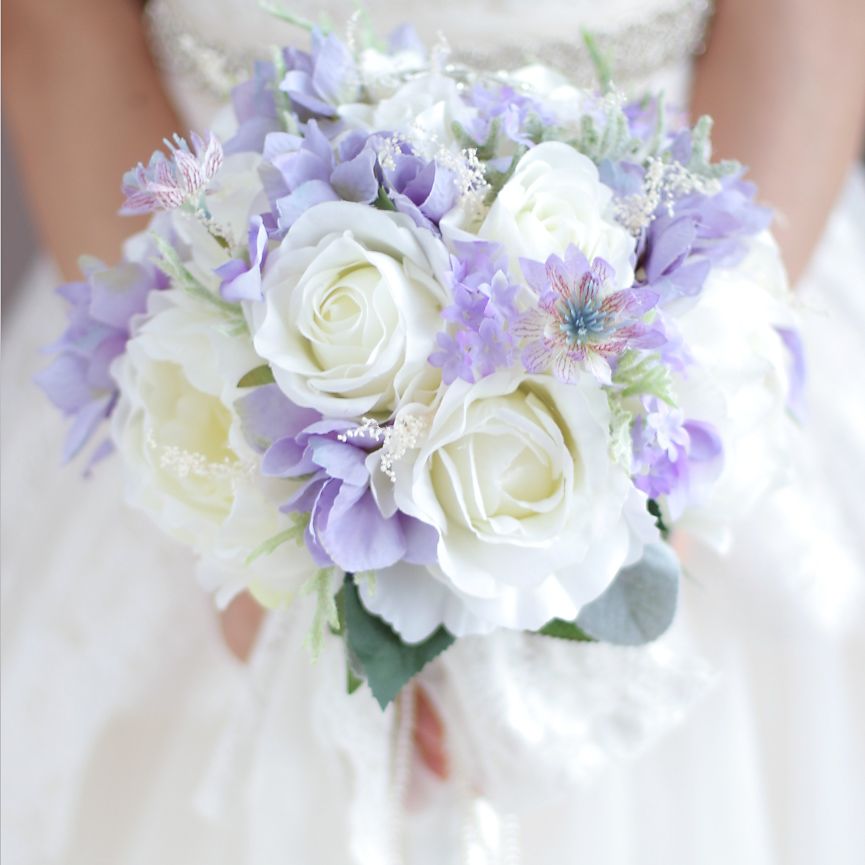 purple and white wedding flower bouquets