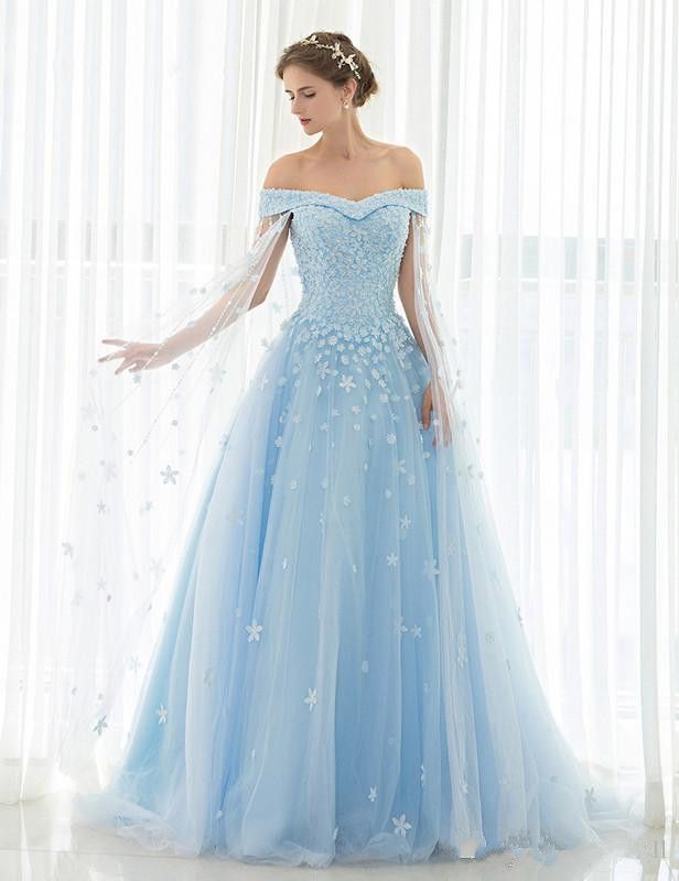 evening dress in pale blue tulle with stole