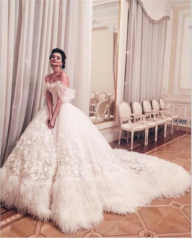 Feather train wedding best sale dress