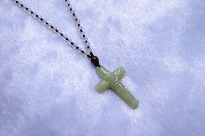 The seiko and titian are the cross of Jesus Christ. Lucky pendant necklace