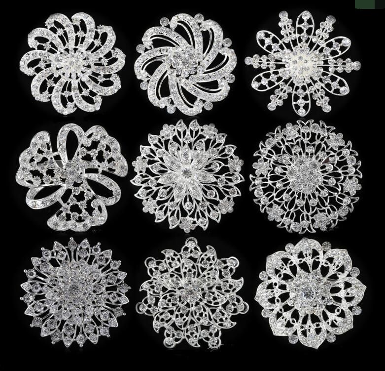 silver brooches and pins