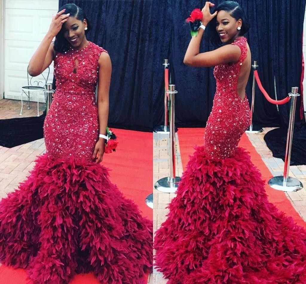 red prom dress with feathers