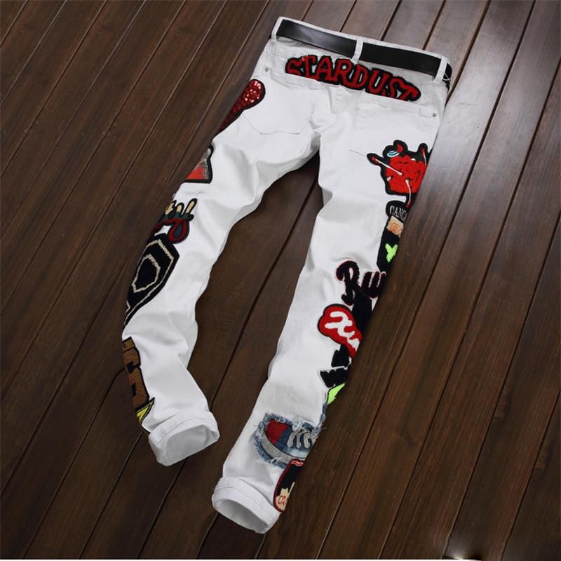 white jeans with patches