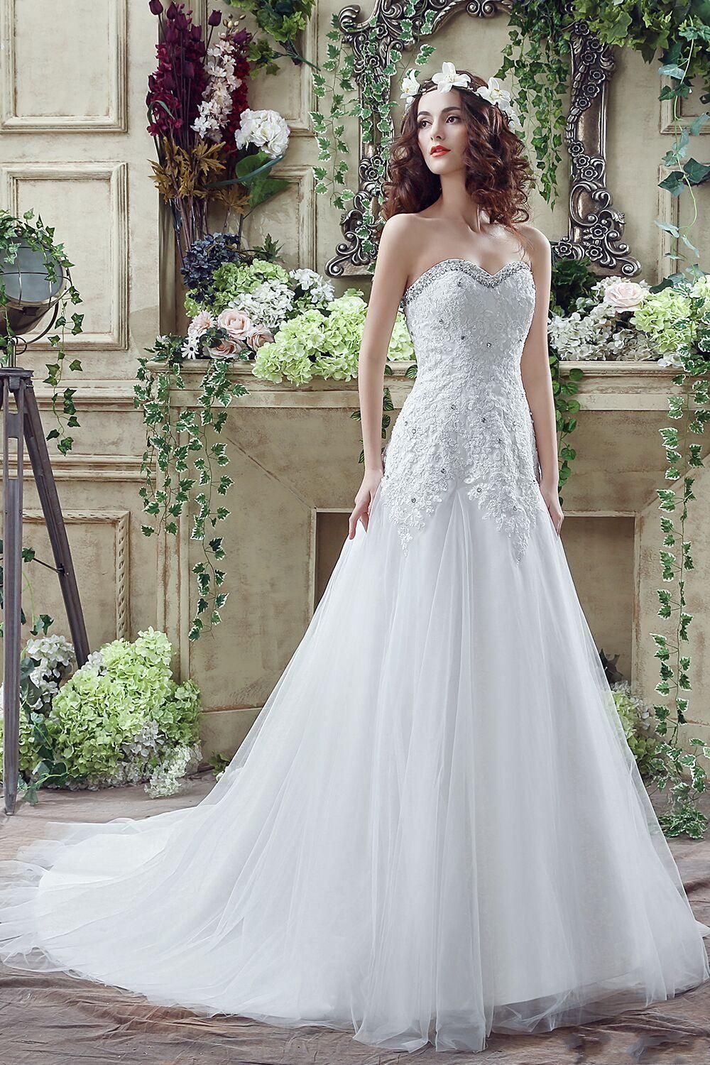 white corset under wedding dress