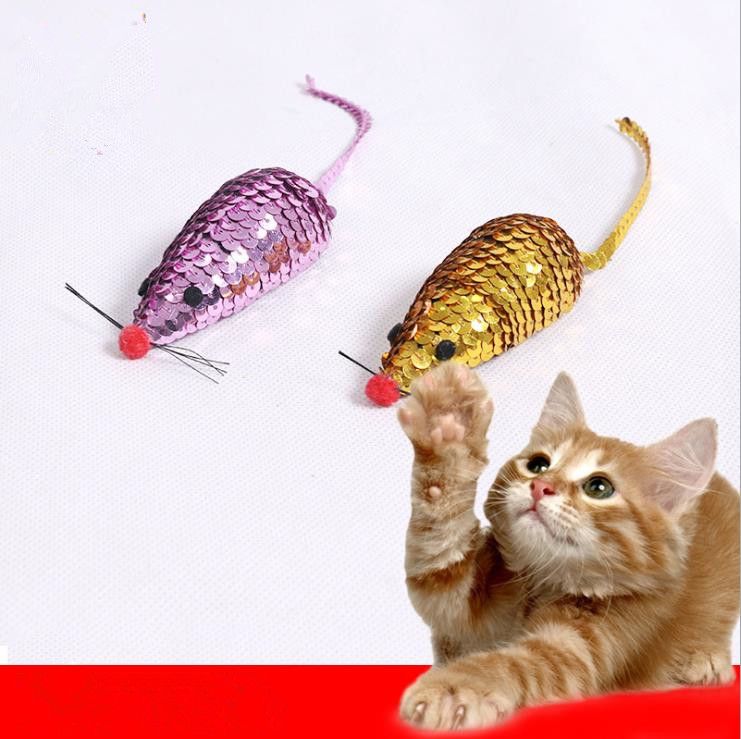 small plastic toy cats