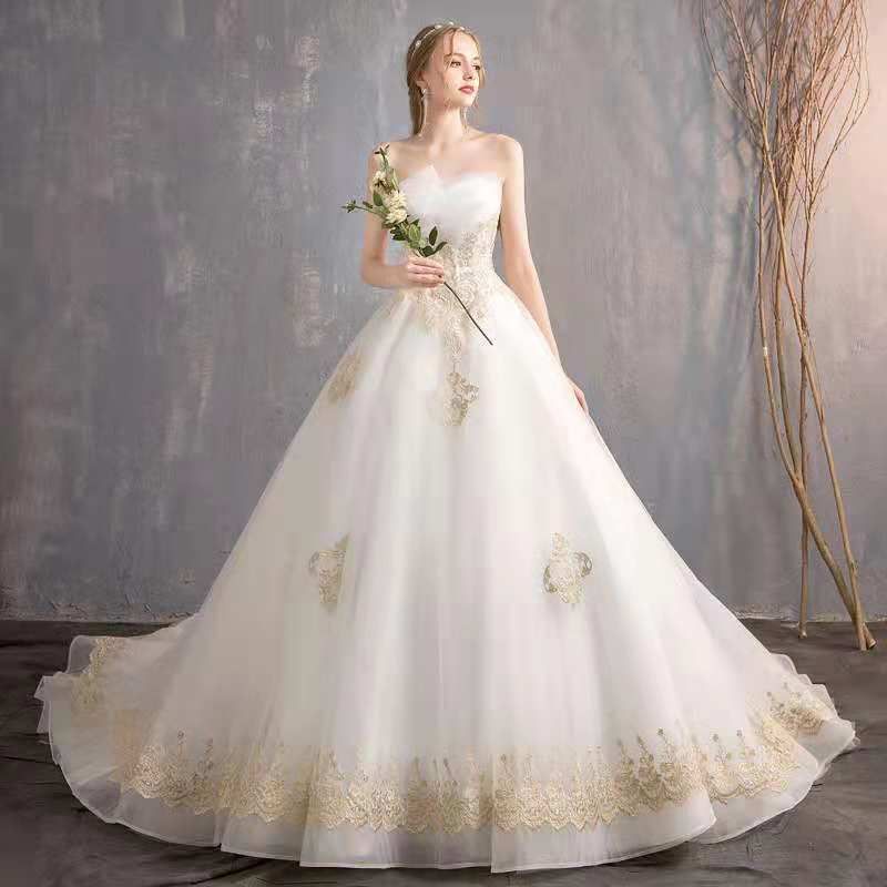 compre una línea de vestidos de novia sin tirantes de tren grande