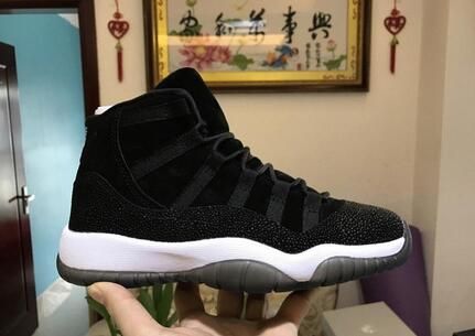 shiny black and gold jordans