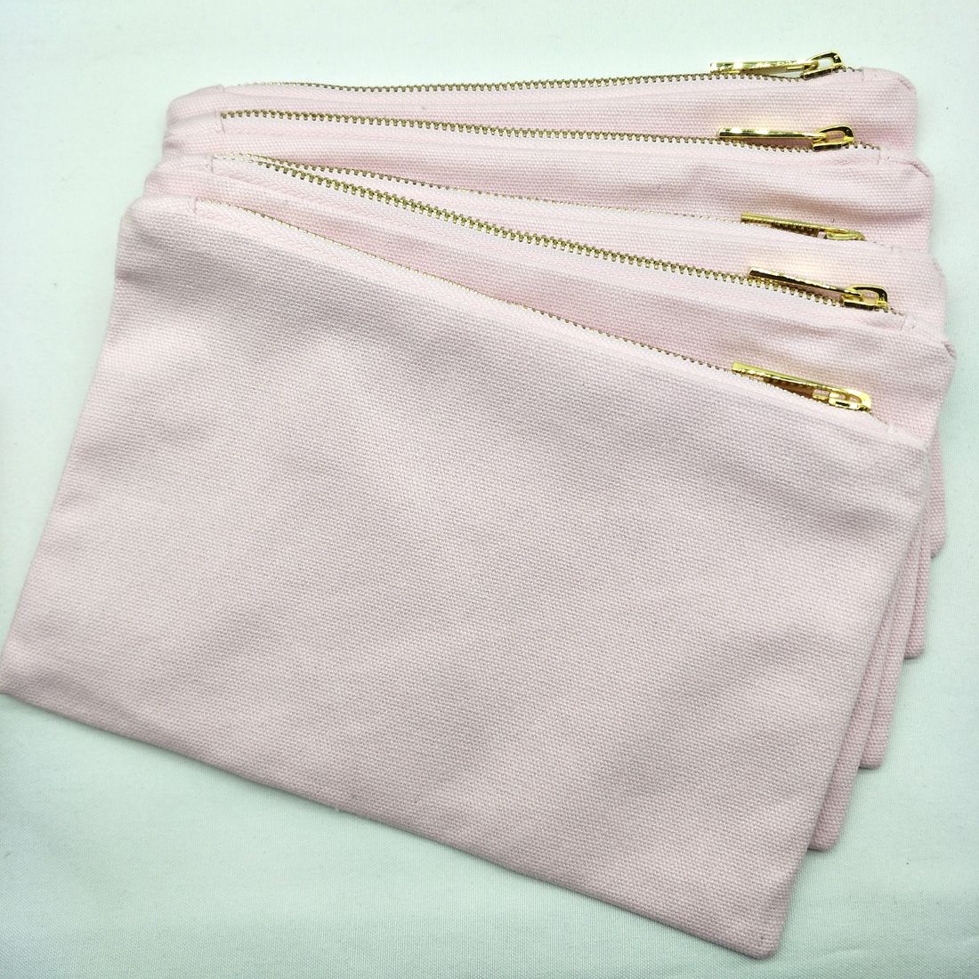 2020 6x9in Light Pink 12oz Canvas Makeup Bag With Gold Zip Gold Lining