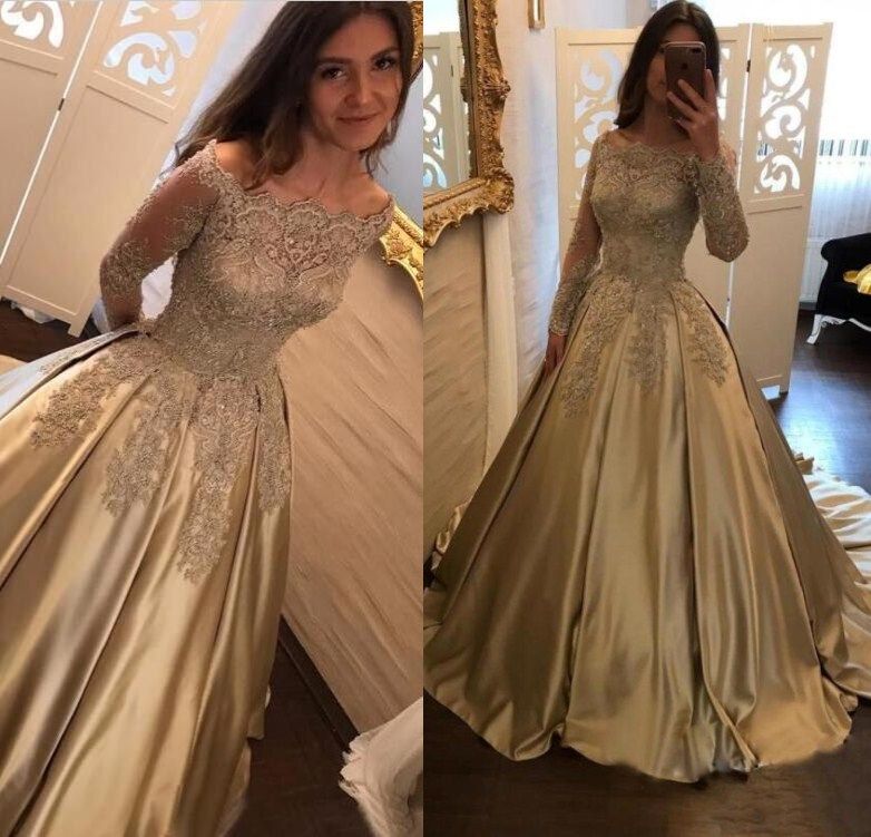 gold ball gown with sleeves