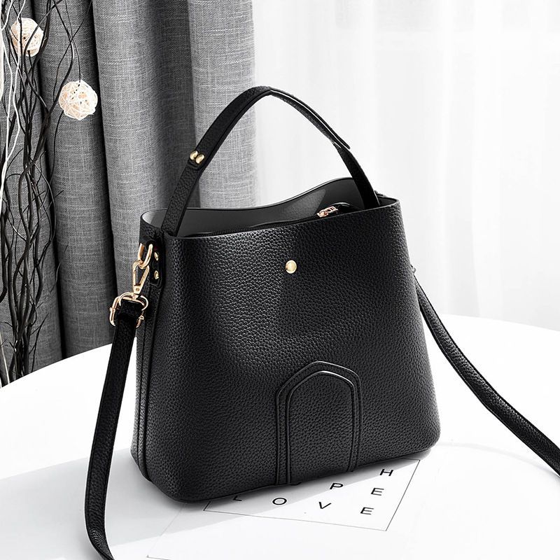 black purse shoulder strap