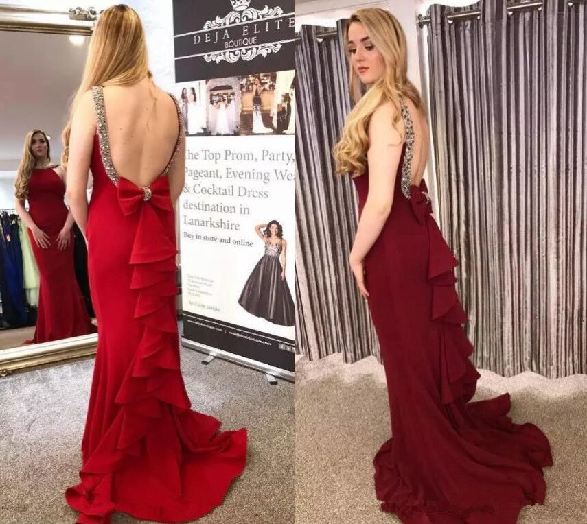 red prom dress with bow on the back