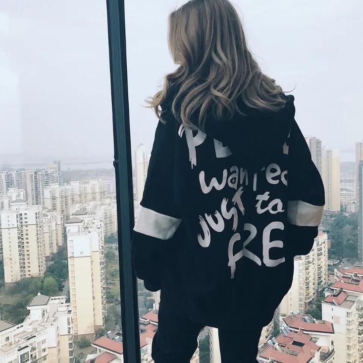 girl wearing oversized hoodie