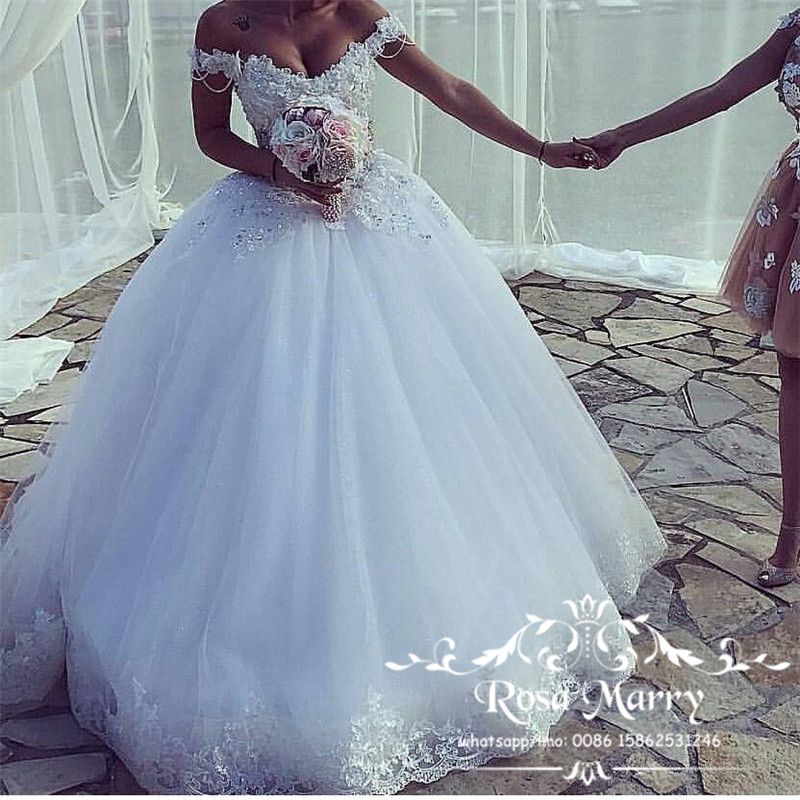 off the shoulder sparkly wedding dress