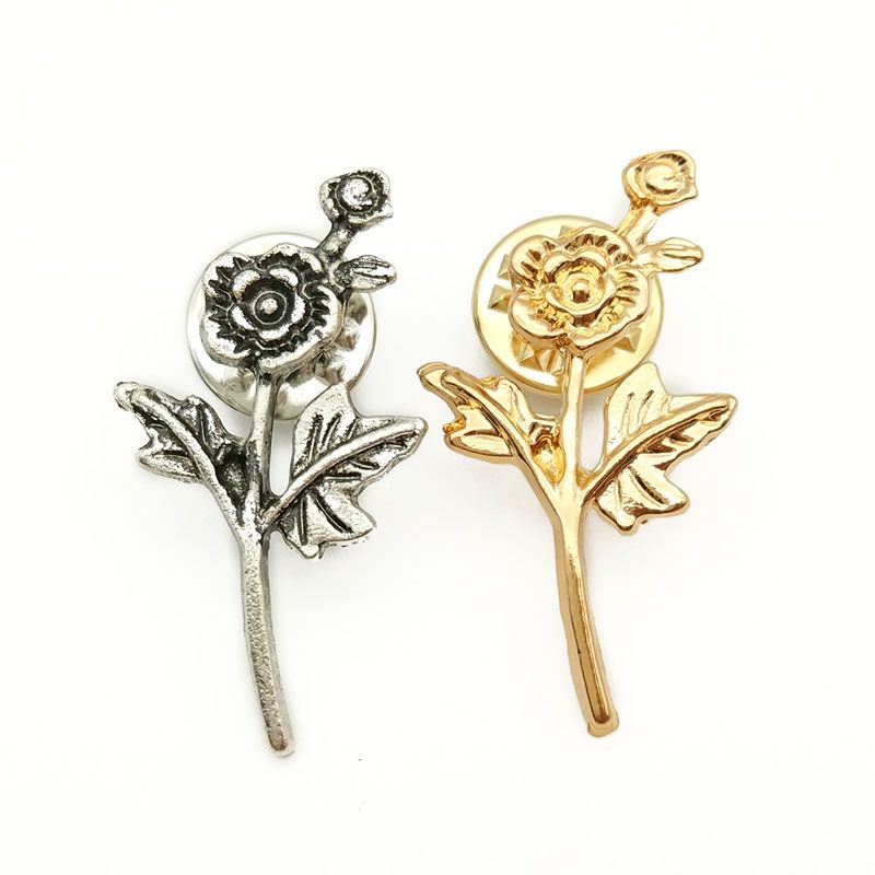 small brooches and pins
