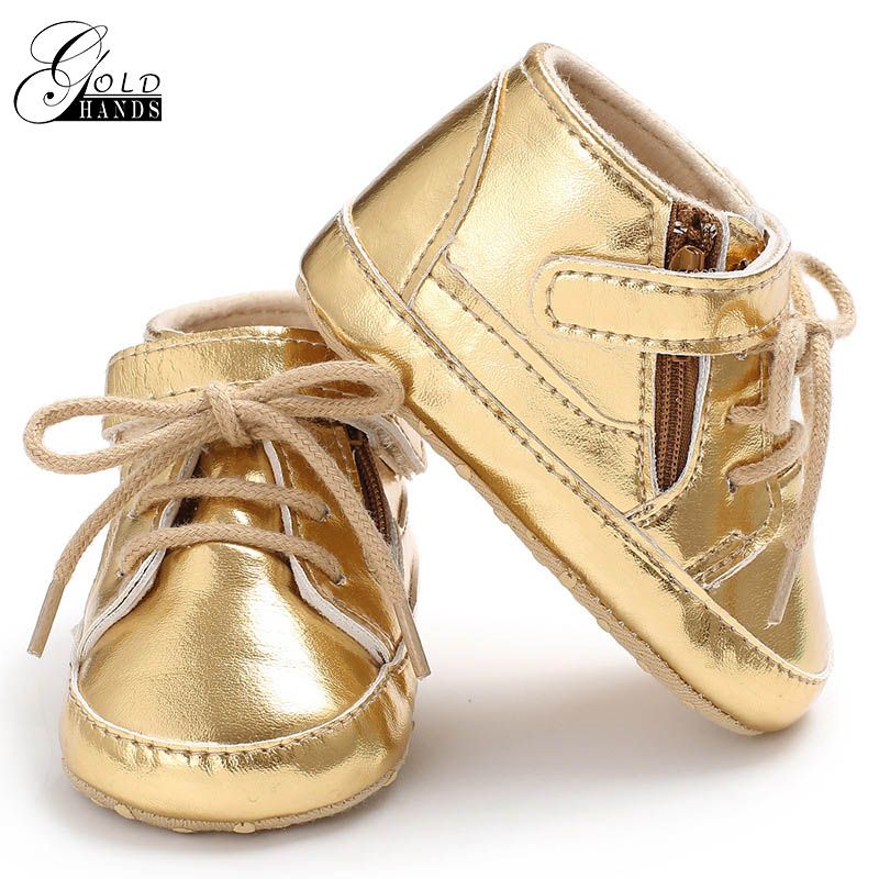 gold baby shoes