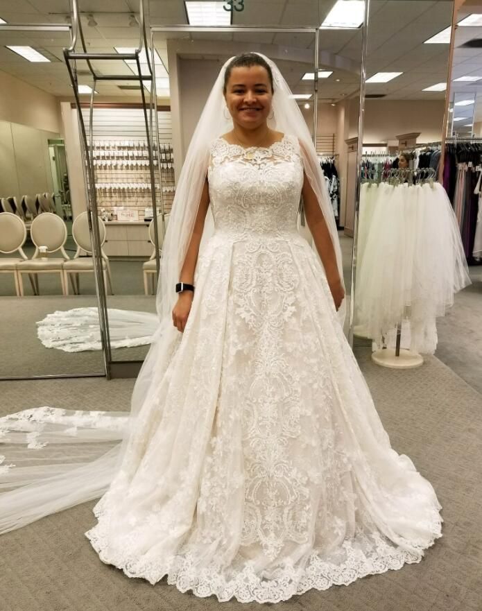 beaded lace wedding dress with pleated skirt