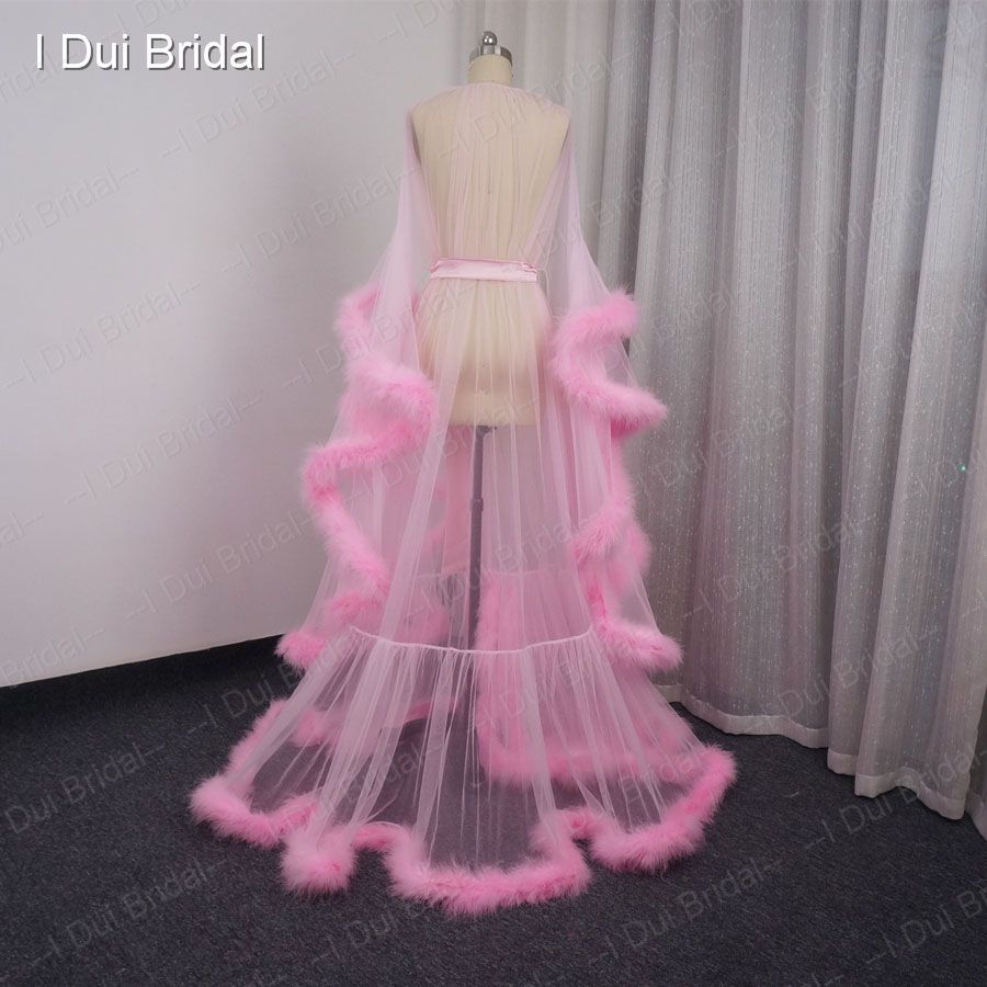pink robe with feathers