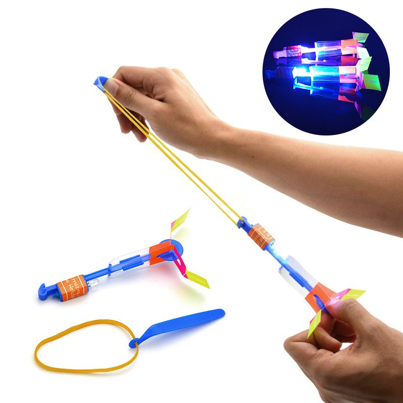 Helicopter Rotating Fly Arrow Toys Amazing Elastic Powered LED Flying