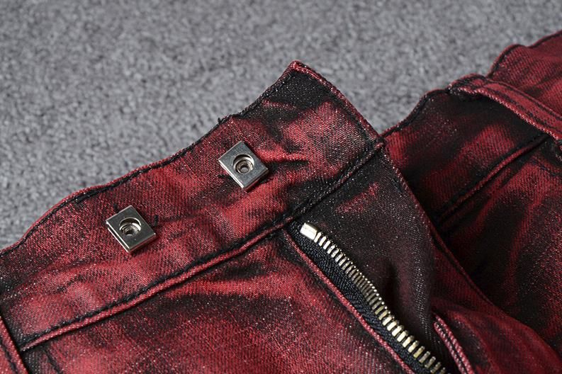 red ripped pants