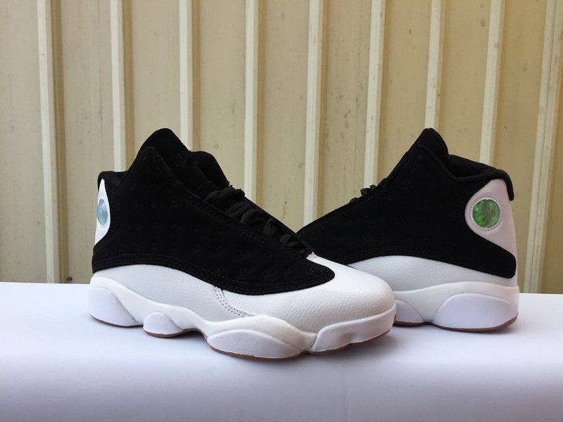 gold and white basketball shoes