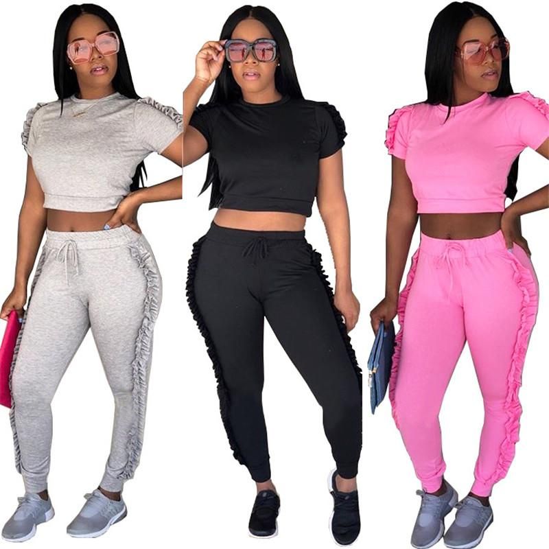 tracksuit bottoms and crop top