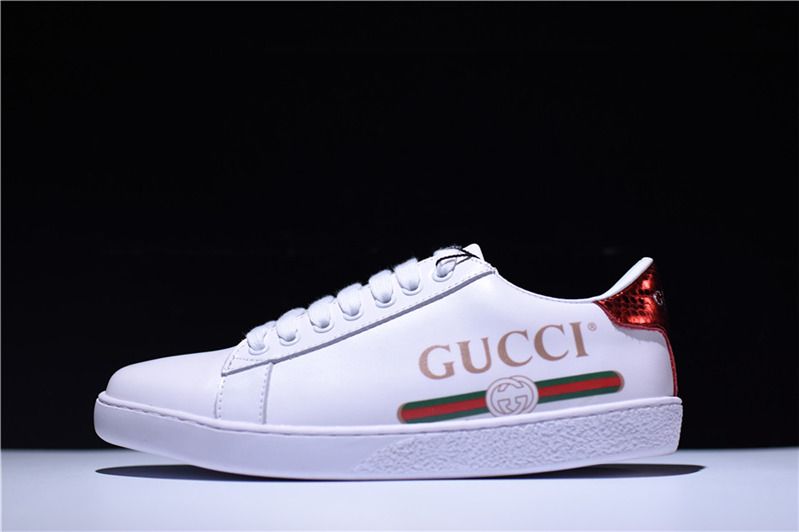branded white sports shoes