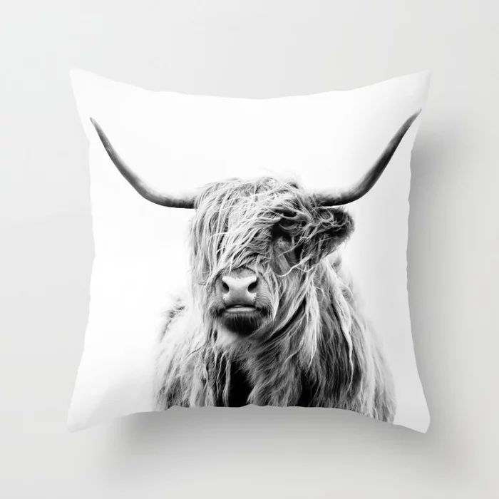black and white cow print pillows