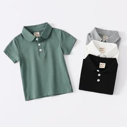 1-7t Enfants Polo T-shirt pour garçons Girl Polo Tshirts School Toddler But Down Collar Basic White Black Kid Polos Vêtements d'été 240425