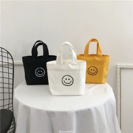 1 PC estilo coreano Smile Face Mini Shopping Bag For Women Fashion Mobile Phone Bag Lady Purse Pequeño bolso informal