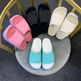 10 A Pantoufles en caoutchouc à emboîtement Macaron pour femmes, chaussures à semelle épaisse, violet, turquoise, respirantes, antidérapantes, pour la maison, décontractées, été, mules en relief