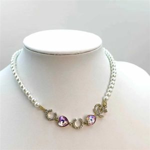 10% de réduction sur les bijoux de créateurs à la mode belle grand-mère petit vent parfumé chaîne de clavicule féminine pendentif coeur violet avec collier de diamants