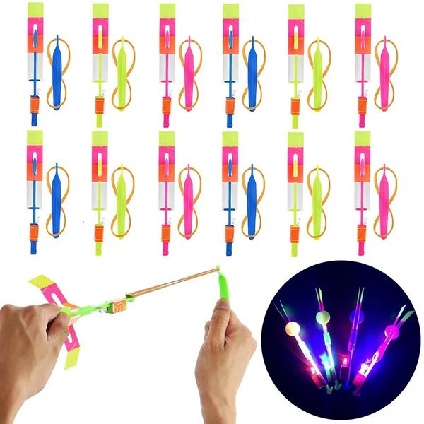 10 pièces LED élingues lumineuses en plein air Flash lumière flèches volantes jouets volants hélicoptère Slingss catapulte enfants adultes jouet accessoires 240105