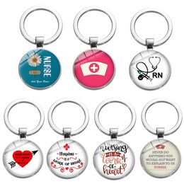 10 PCS/Lot Fashion Key Rings Custom Nursing is een werk van hart RN RN Hospital Medical Symbol Keychain voor verpleegkundige dokter cadeau