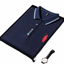 100% cott Polo de marque de luxe pour hommes 2024 Printemps Nouveau Spur Embroid Lg Manches British Busin Fi T-shirt imprimé à revers C2or #