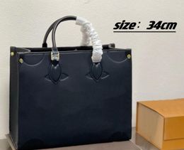 100% koeienhuid onderweg tote GM tassen dames klassiek echt leer reliëf sculptuur handtas luxe ontwerper perfect voor versie tote boodschappentassen cross body bag 25 34cm