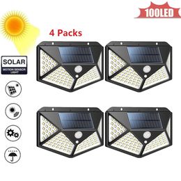 100 LED Lampes solaires sans fil LED Décor extérieur Contrôle de la lumière Applique murale solaire pour jardin Rue Lampe solaire 4 faces 270ﾰ portée d'éclairage Wirel