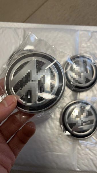 100 unids/lote insignia de coche VW tapacubos de centro de rueda emblema insignia Logo 56mm 65mm para VW Volkswagon