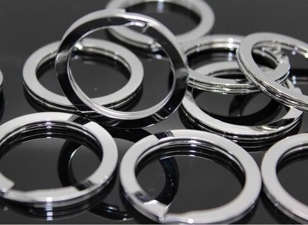 100 pcs/lote de acero inoxidable de acero inoxidable metal redondeo llave de llave de anillo de rodio de rodio 25 mm 28 mm 30 mm 32 mm 33 mm 35 mm