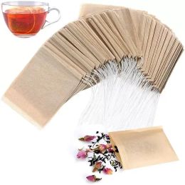 100 pcs/lote de filtro de té Filtros Herramientas Natural Infusor de papel desechable de papel desechable de madera sin blanquear con bolsa con cordón