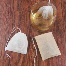 100 stks / partij theefilterzakken natuurlijke houtpapier theezakje wegwerp thee infuser lege tas met trekkoord voor kruiden koffie