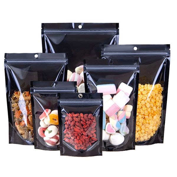 100 pcs Stand Up refermables sacs en papier d'aluminium noir en gros en plastique transparent avant Doypack brillant Mylar pochettes pour les collations alimentaires stockage de thé séché