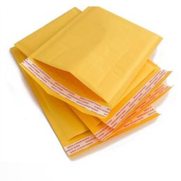 100 PCS Bolsas de correo de burbujas amarillas Bolsa de sobre de papel kraft dorado Prueba nuevo embalaje expreso Mgceu