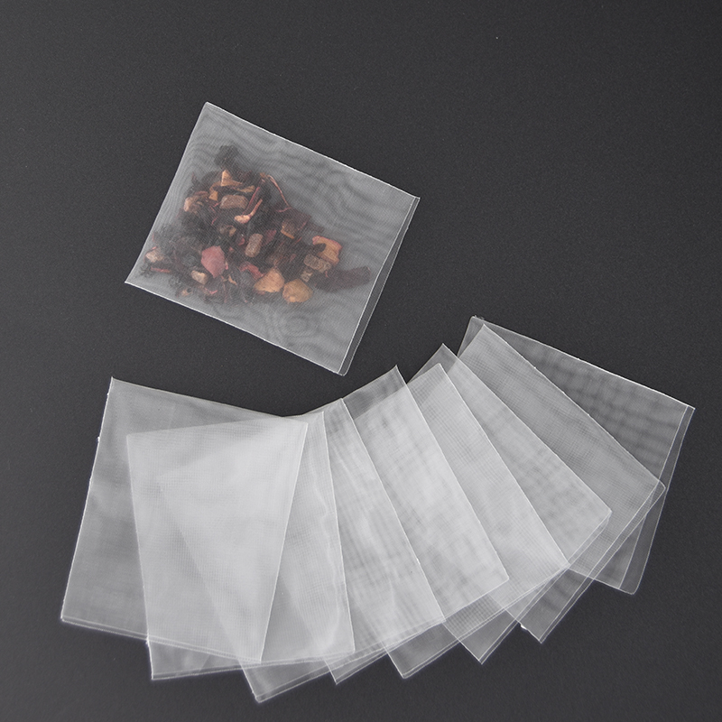 Gratis frakt! 10000 st transparent nylon tomma kaffeverktyg engångspulverpaket heal tätningsfilterväska för lös te krydda ört