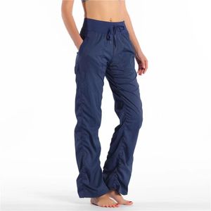 1004 Pantalons de danse de yoga High Taist Gym Sport Détend Lady Loose Pantalon Femmes Sports Collons de gym