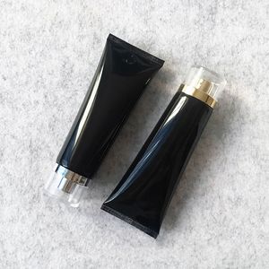 Botella de crema cosmética de plástico negro de 100g, tubo de loción limpiadora Facial de 100ml, botellas de embalaje de champú para suministro de hotel